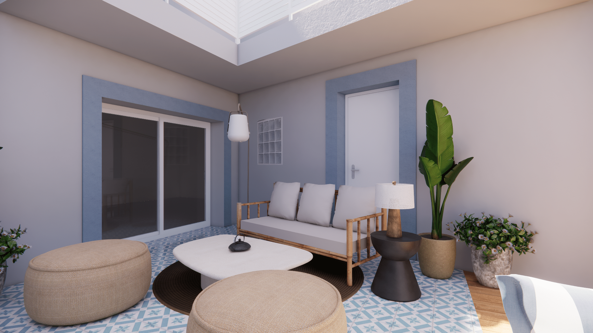 Patio méditerranéen : canapé bambou, poufs beiges et carrelage bleu géométrique.